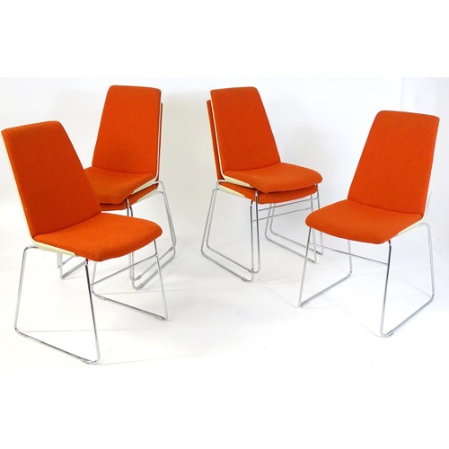 1793 - A set of six mid century stacking chairs, with orange and cream upholstery and raised on chromed tub... 