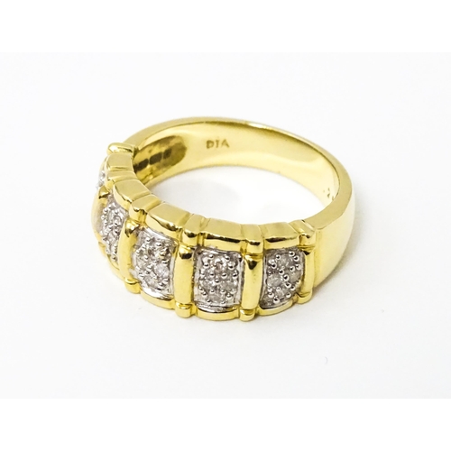 624 - A 14ct gold ring set with diamonds. Ring size approx. M 1/2