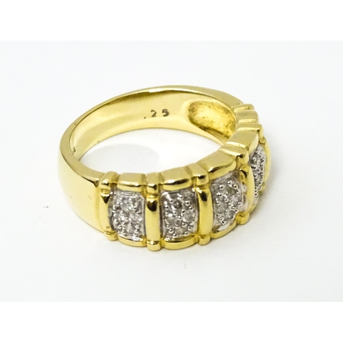 624 - A 14ct gold ring set with diamonds. Ring size approx. M 1/2