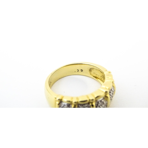 624 - A 14ct gold ring set with diamonds. Ring size approx. M 1/2