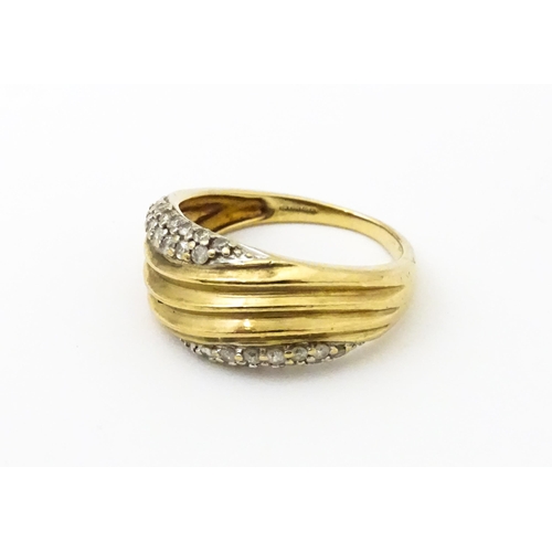 656 - A 9ct gold ring set with diamonds, Ring size approx. M 1/2