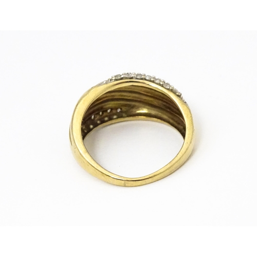 656 - A 9ct gold ring set with diamonds, Ring size approx. M 1/2