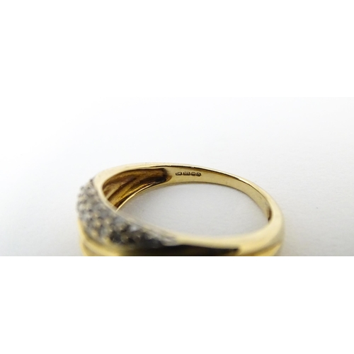 656 - A 9ct gold ring set with diamonds, Ring size approx. M 1/2