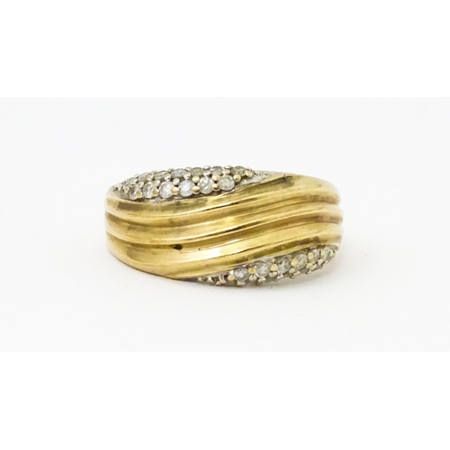 656 - A 9ct gold ring set with diamonds, Ring size approx. M 1/2