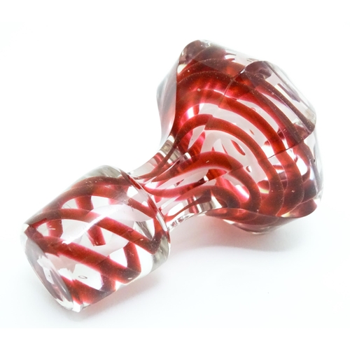 260 - A Victorian cranberry and white glass Nailsea style decanter and stopper, with clear glass foot. App... 