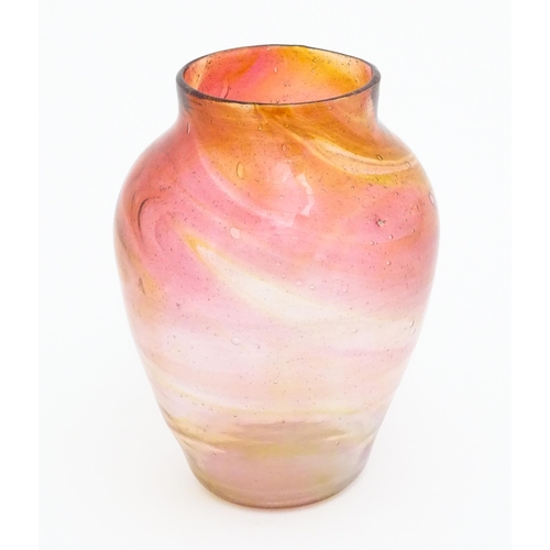 265 - A hand blown art glass vase with peach and pink detail. In the manner of Hartley Wood.  Approx 8