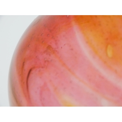 265 - A hand blown art glass vase with peach and pink detail. In the manner of Hartley Wood.  Approx 8