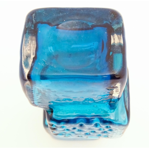 267 - A Whitefriars Drunken Bricklayer kingfisher blue textured glass vase, designed by Geoffrey Baxter. A... 