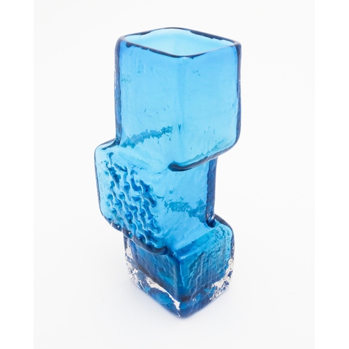 267 - A Whitefriars Drunken Bricklayer kingfisher blue textured glass vase, designed by Geoffrey Baxter. A... 