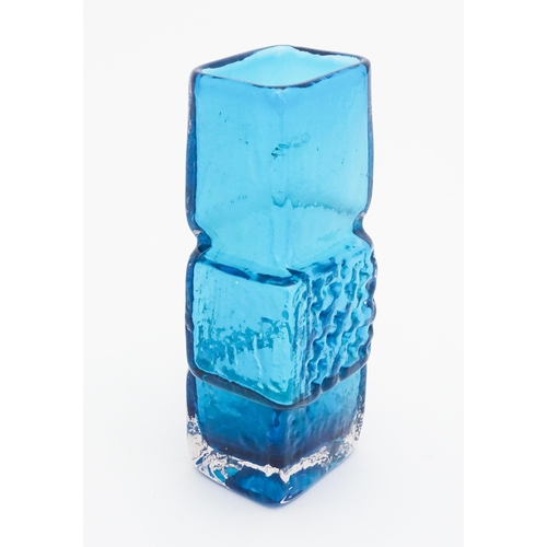 267 - A Whitefriars Drunken Bricklayer kingfisher blue textured glass vase, designed by Geoffrey Baxter. A... 