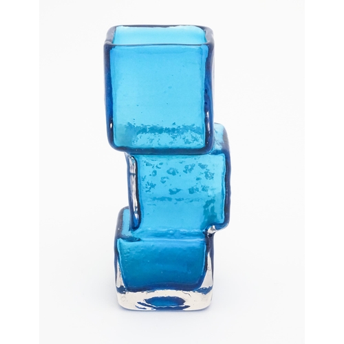 267 - A Whitefriars Drunken Bricklayer kingfisher blue textured glass vase, designed by Geoffrey Baxter. A... 