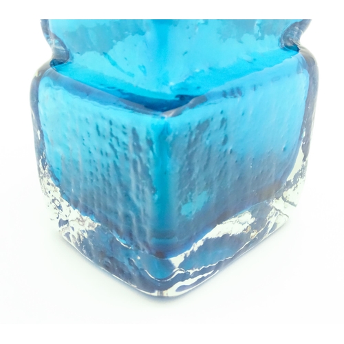 267 - A Whitefriars Drunken Bricklayer kingfisher blue textured glass vase, designed by Geoffrey Baxter. A... 