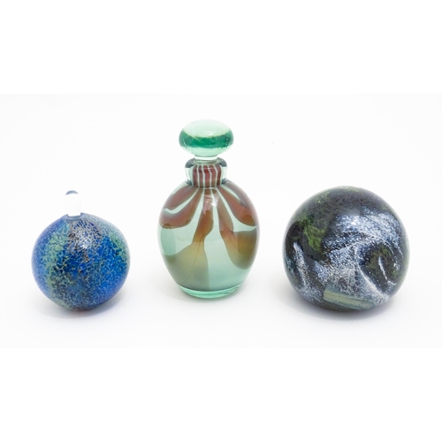 277 - Three items of art glass comprising a Mdina glass paperweight, a scent / perfume bottle and stopper ... 