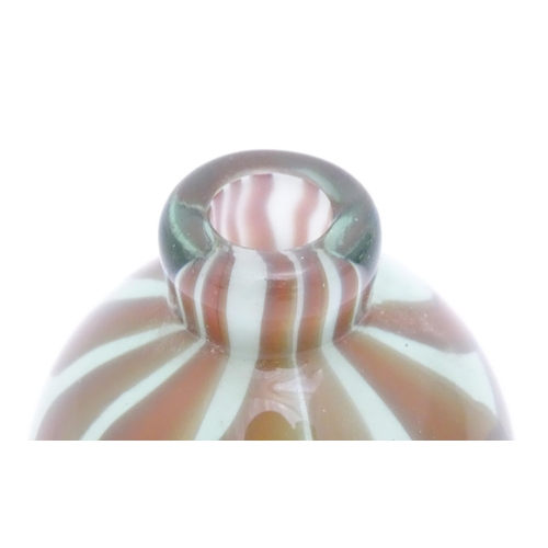 277 - Three items of art glass comprising a Mdina glass paperweight, a scent / perfume bottle and stopper ... 