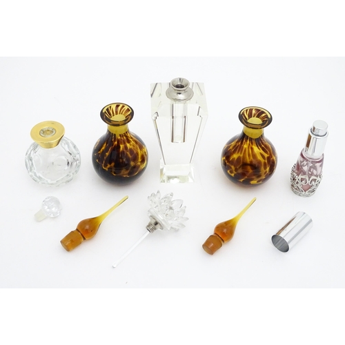 280 - Assorted glass scent / perfume bottles. The tallest approx. 6 1/4