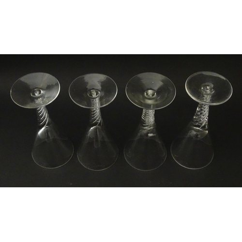 281 - Four late 20thC drinking gasses with air twist detail to stems (4)