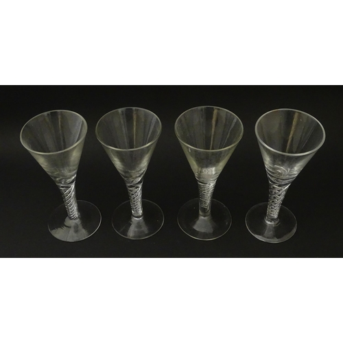 281 - Four late 20thC drinking gasses with air twist detail to stems (4)