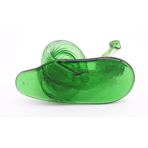 283 - A green glass model of a snail. Approx. 5 3/4