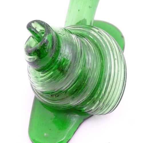 283 - A green glass model of a snail. Approx. 5 3/4