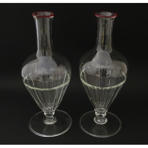 289 - Salviati & Co. Glassware: Two Venetian glass carafes with pink detail to rims. Approx. 11