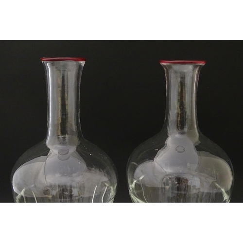 289 - Salviati & Co. Glassware: Two Venetian glass carafes with pink detail to rims. Approx. 11