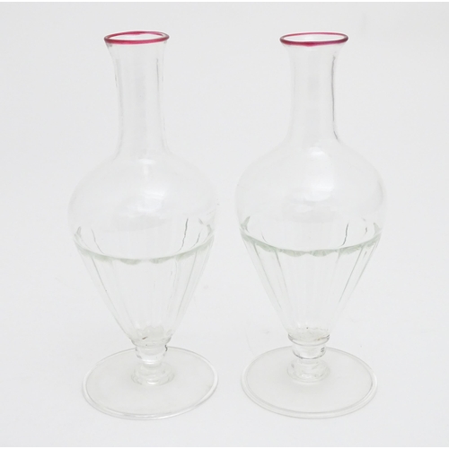 289 - Salviati & Co. Glassware: Two Venetian glass carafes with pink detail to rims. Approx. 11