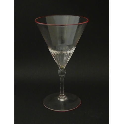 290 - Salviati & Co. Glassware: Seven Venetian glass pedestal drinking glasses with pink detail to rims. A... 