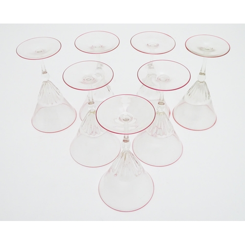 290 - Salviati & Co. Glassware: Seven Venetian glass pedestal drinking glasses with pink detail to rims. A... 