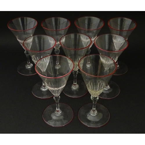 293 - Salviati & Co. Glassware: Nine Venetian glass pedestal drinking glasses with pink detail to rims. Ap... 