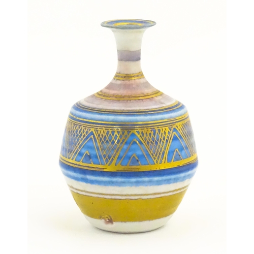 100 - A small studio pottery vase by Mary Rich with banded and geometric detail. Impressed mark lower. App... 