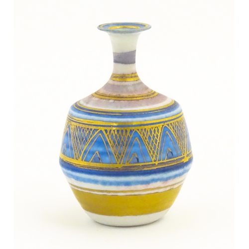 100 - A small studio pottery vase by Mary Rich with banded and geometric detail. Impressed mark lower. App... 