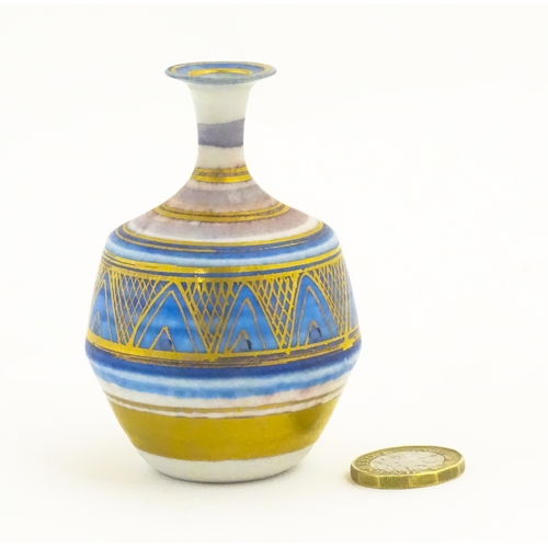 100 - A small studio pottery vase by Mary Rich with banded and geometric detail. Impressed mark lower. App... 