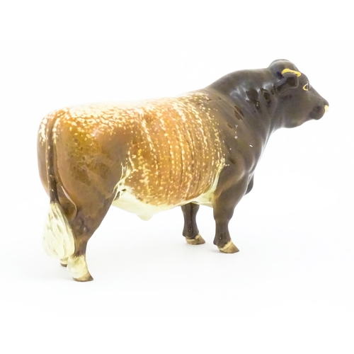 109 - A Beswick model of a Dairy Shorthorn Bull. Marked and titled under Ch. / Champion Gwersylt Lord Oxfo... 