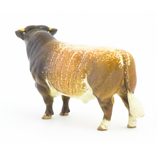 109 - A Beswick model of a Dairy Shorthorn Bull. Marked and titled under Ch. / Champion Gwersylt Lord Oxfo... 