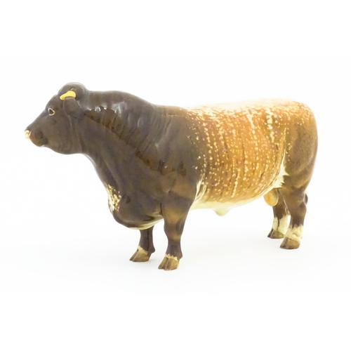 109 - A Beswick model of a Dairy Shorthorn Bull. Marked and titled under Ch. / Champion Gwersylt Lord Oxfo... 