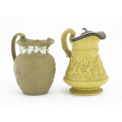 110 - A Ridgway & Co. jug with a hinged pewter lid, the body decorated in relief in the Tam O'Shanter patt... 