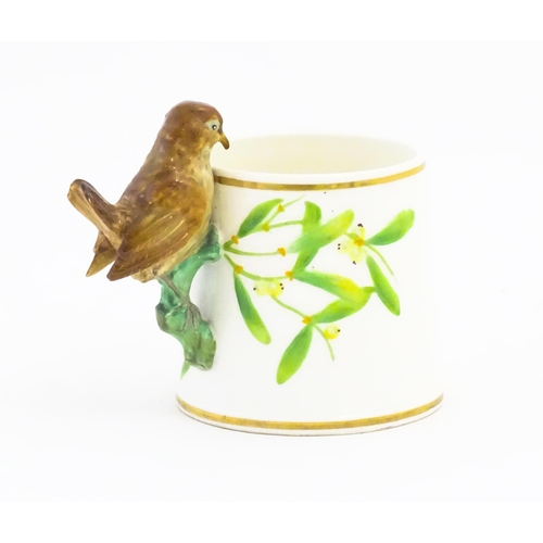 123 - A Victorian Copeland mug, the handle modelled as a wren / bird perched on a looped branch, the body ... 