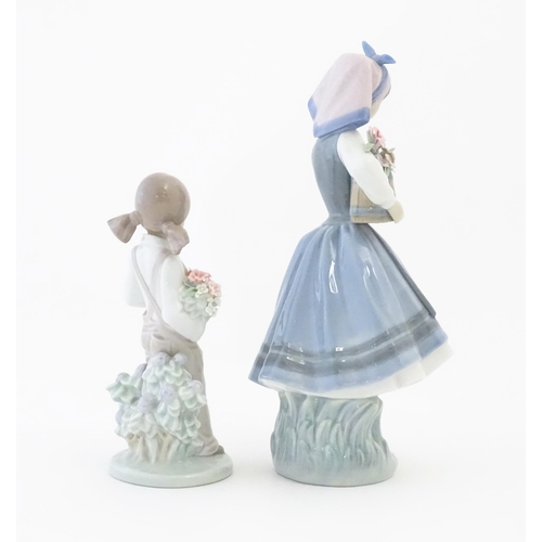 140 - Two Lladro figures comprising Budding Blossoms model no. 1416 and Spring Child model no. 5.217. One ... 