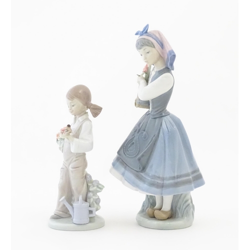 140 - Two Lladro figures comprising Budding Blossoms model no. 1416 and Spring Child model no. 5.217. One ... 