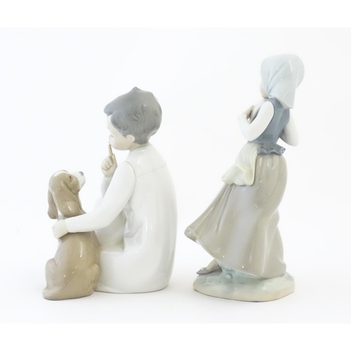 141 - Two Lladro figures comprising Girl with Doves model no. 4915 and Boy with Dog model no. 4522. Larges... 