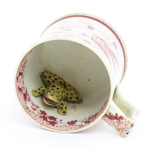 52 - A 19thC frog mug, the exterior decorated with transfer printed birds, flowers and foliage, initialle... 