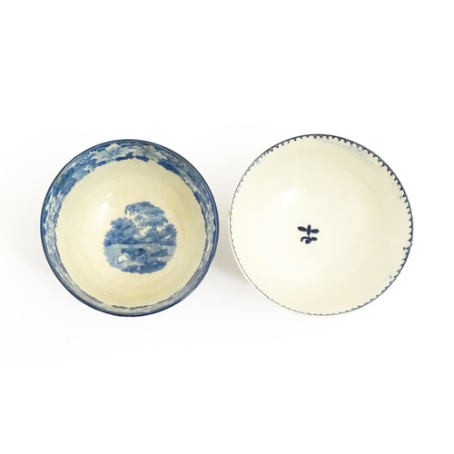 64 - A Liverpool James Pennington blue and white tea bowl with flower detail. Together with a Copeland st... 