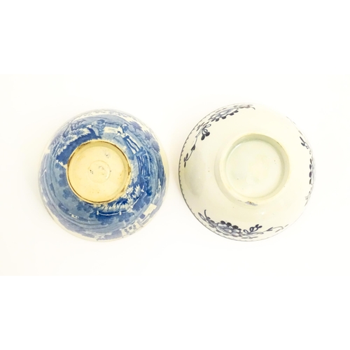 64 - A Liverpool James Pennington blue and white tea bowl with flower detail. Together with a Copeland st... 