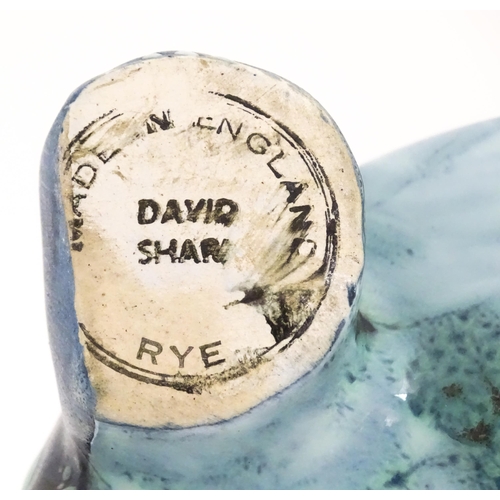 97 - A studio pottery money box modelled as a tortoise by David Sharp for Rye Pottery. Marked under. Appr... 