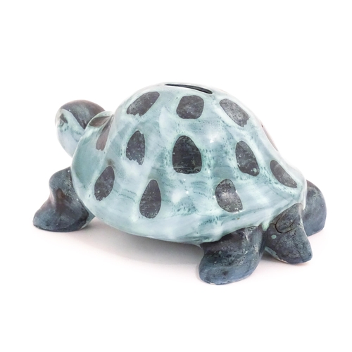 97 - A studio pottery money box modelled as a tortoise by David Sharp for Rye Pottery. Marked under. Appr... 