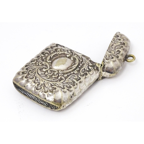 316 - A silver plate vesta case with embossed decoration. Approx. 2