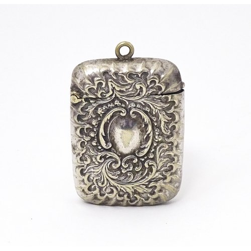 316 - A silver plate vesta case with embossed decoration. Approx. 2