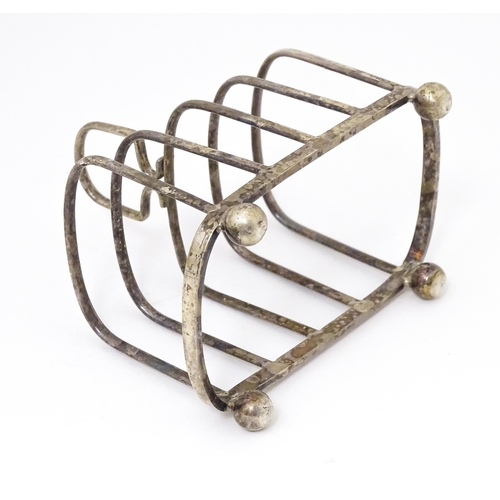 319 - An Art Deco silver five bar toast rack hallmarked London 1929 maker J B Chatterley & Sons Ltd. 4