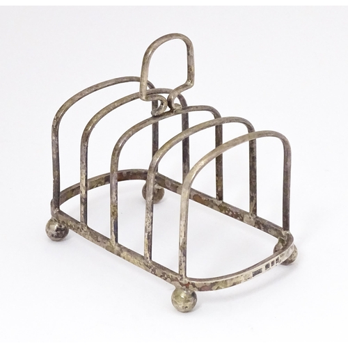 319 - An Art Deco silver five bar toast rack hallmarked London 1929 maker J B Chatterley & Sons Ltd. 4