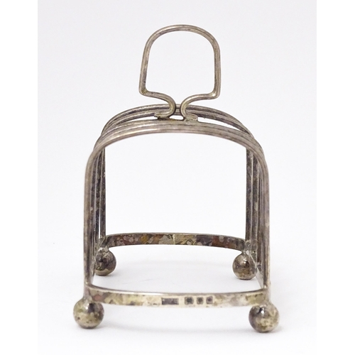 319 - An Art Deco silver five bar toast rack hallmarked London 1929 maker J B Chatterley & Sons Ltd. 4